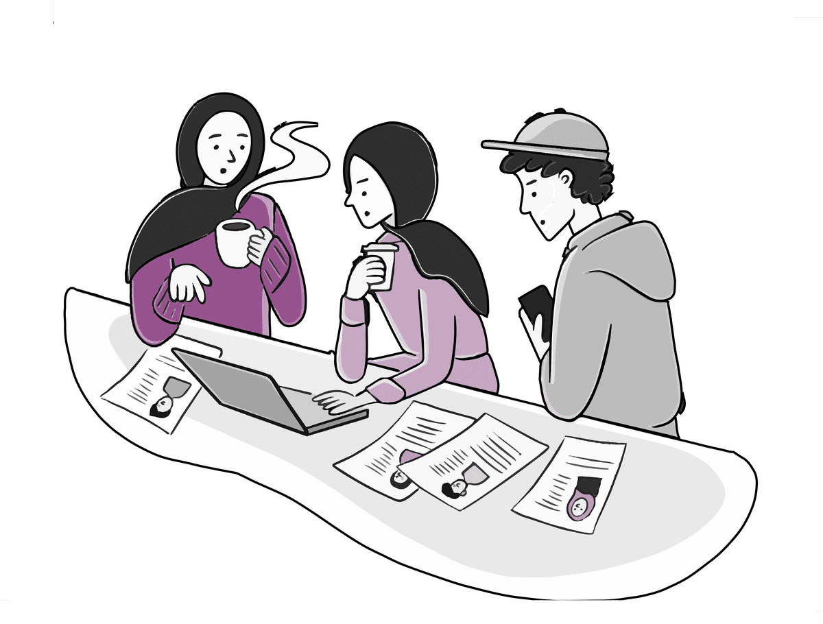 Three people reviewing curated profiles around a table, representing inpairs' quality-focused approach